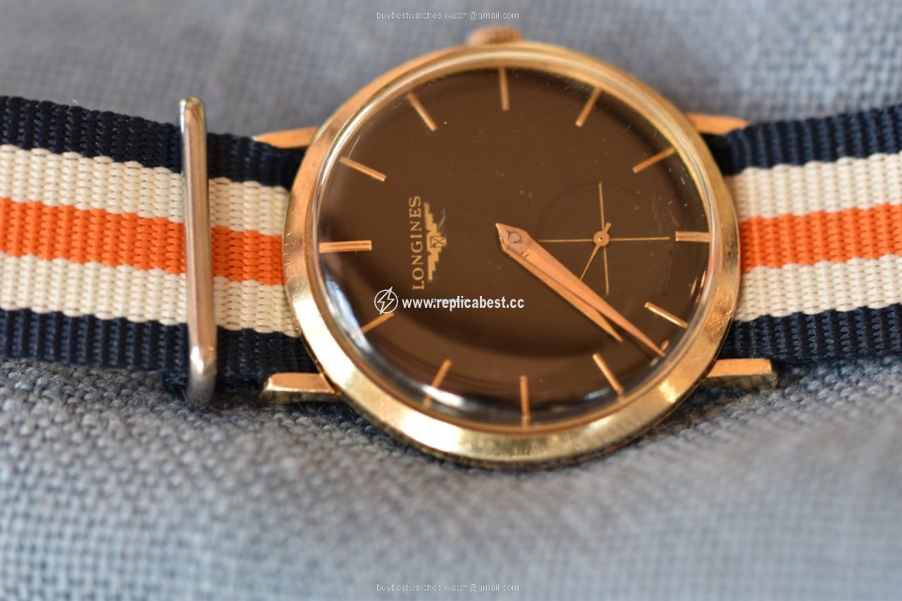 Longines Conquest Heritage Mens watch Unisex Automatic Yellow gold L1.611.6