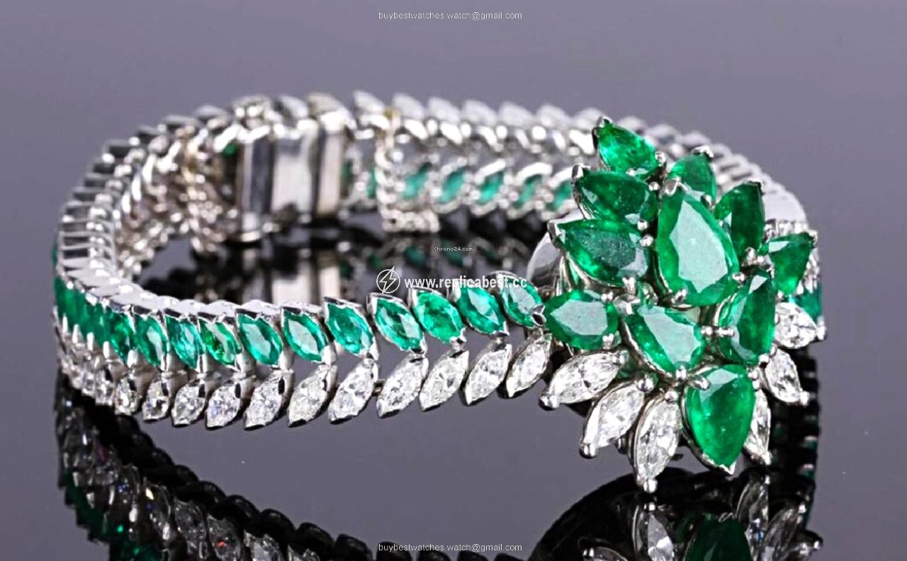 IWC Womens watch Manual winding Platinum 1940s IWC RARE PLATINUM EMERALD DIAMOND CONCEALED LADIES